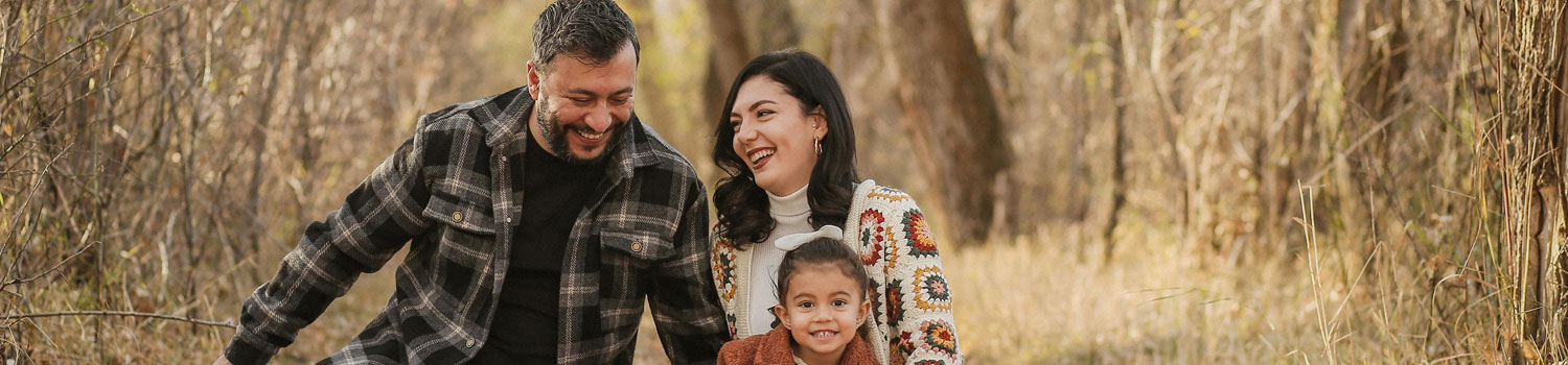 An image of a happy family on a walk.